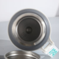 Stainless Steel Travel Flask with Handle & Cup Lid – Dual-Tone Design