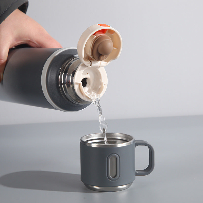Stainless Steel Travel Flask with Handle & Cup Lid – Dual-Tone Design