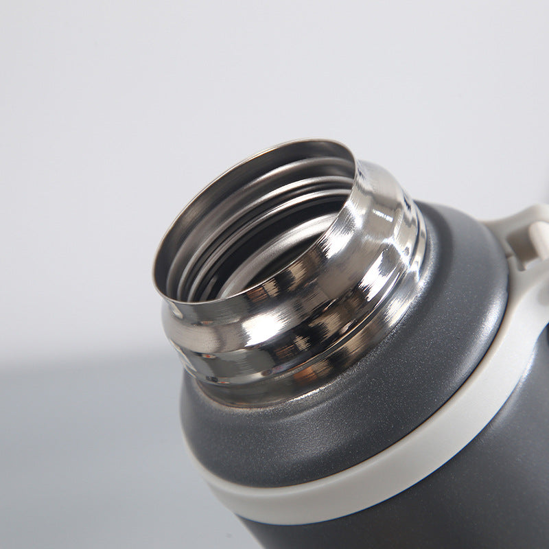 Stainless Steel Travel Flask with Handle & Cup Lid – Dual-Tone Design